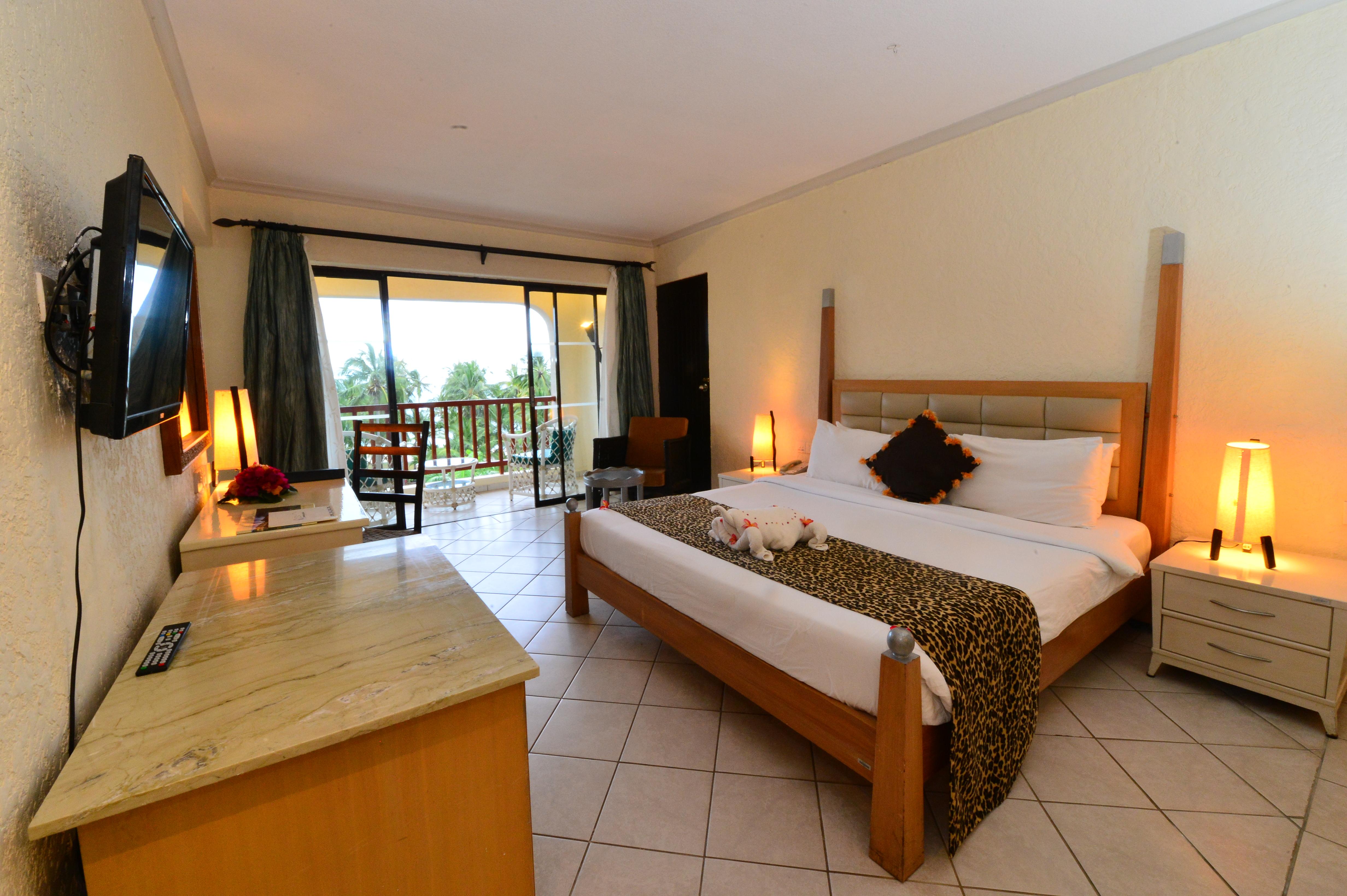 Diani Reef Beach Resort & Spa - Your Beachfront Bliss Awaits Diani Beach Esterno foto Deluxe Room