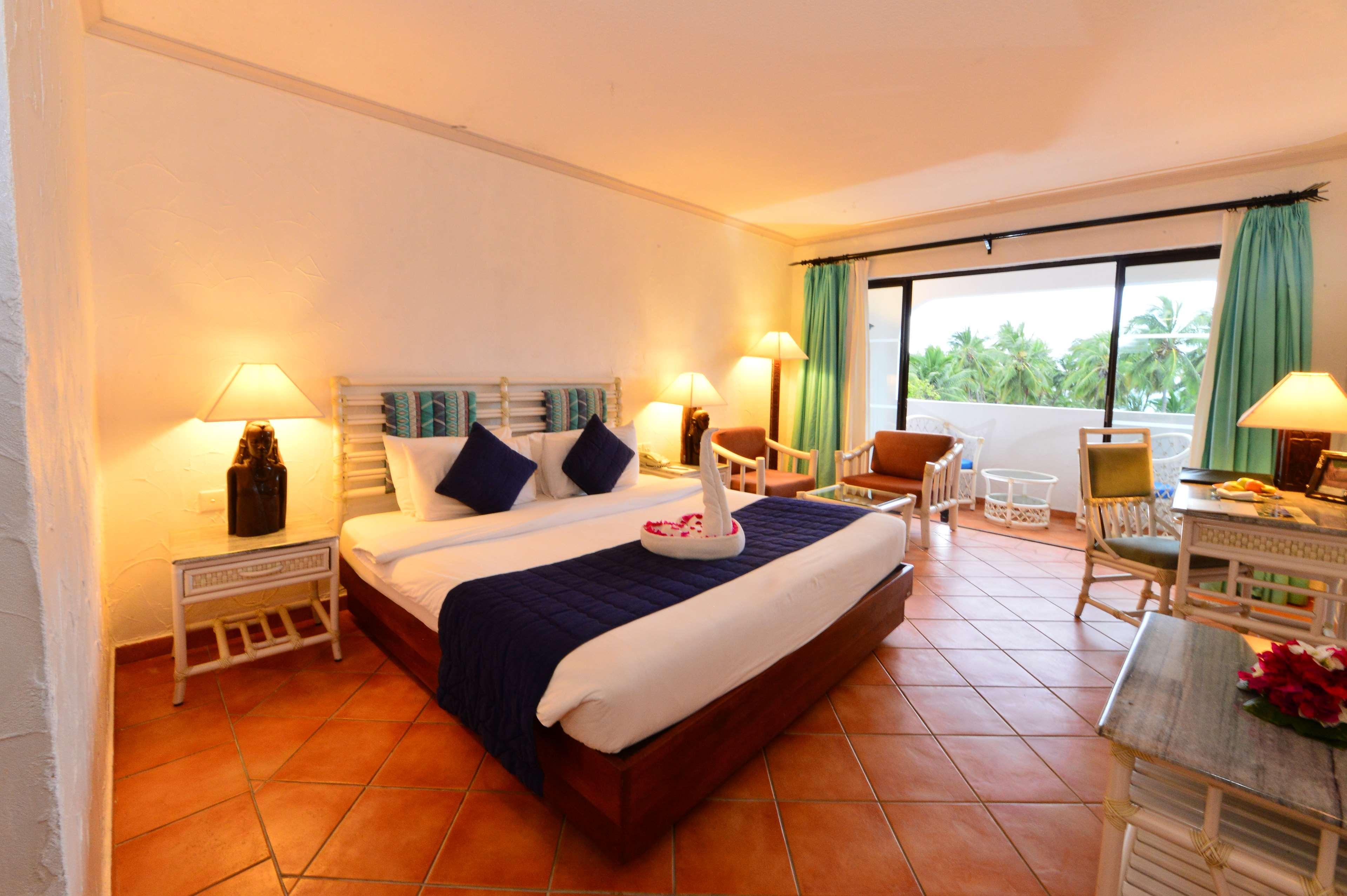 Diani Reef Beach Resort & Spa - Your Beachfront Bliss Awaits Diani Beach Esterno foto Deluxe Room