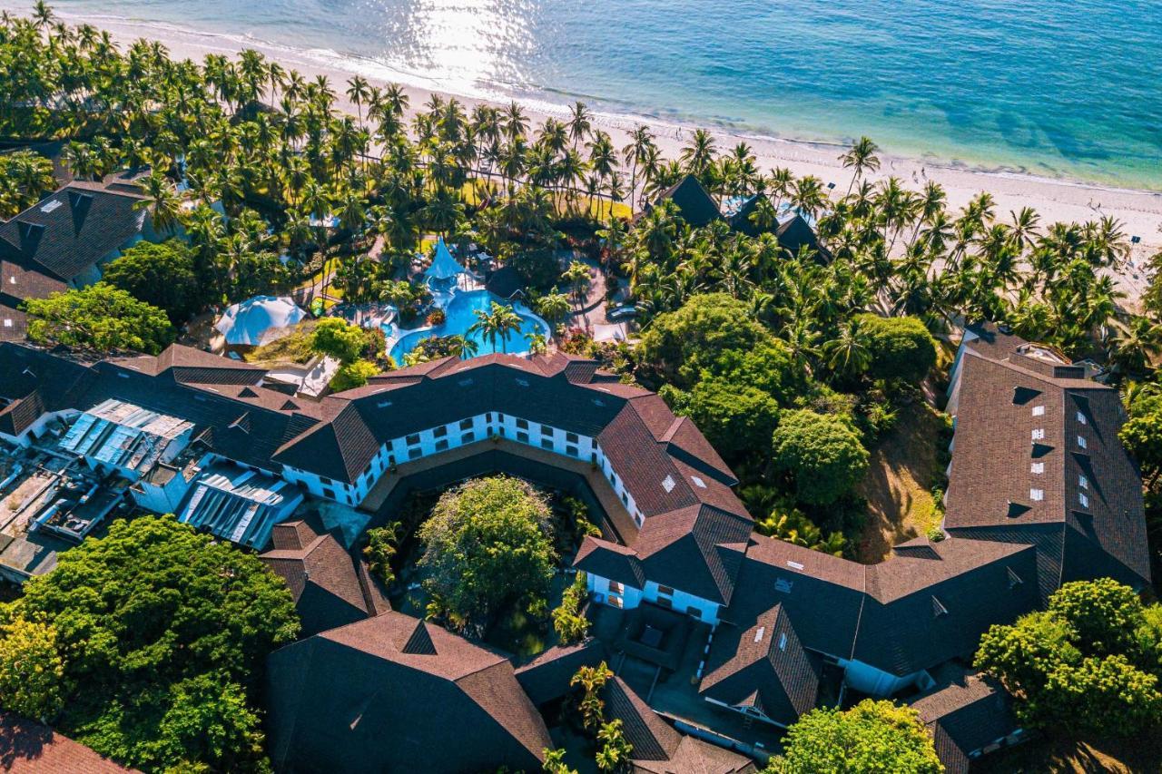 Diani Reef Beach Resort & Spa - Your Beachfront Bliss Awaits Diani Beach Esterno foto Aerial view of the resort