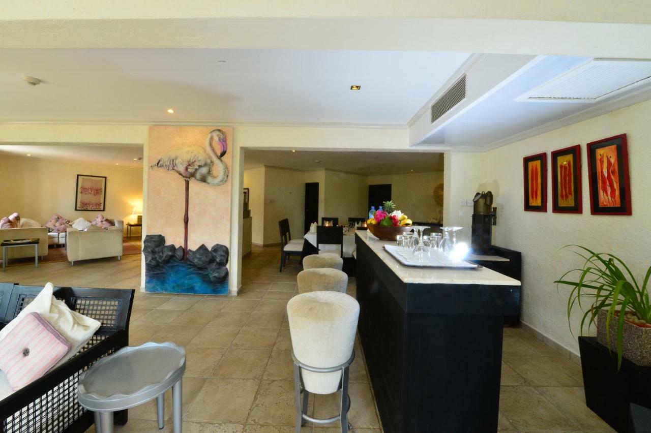 Diani Reef Beach Resort & Spa - Your Beachfront Bliss Awaits Diani Beach Esterno foto The interior of a suite at the hotel